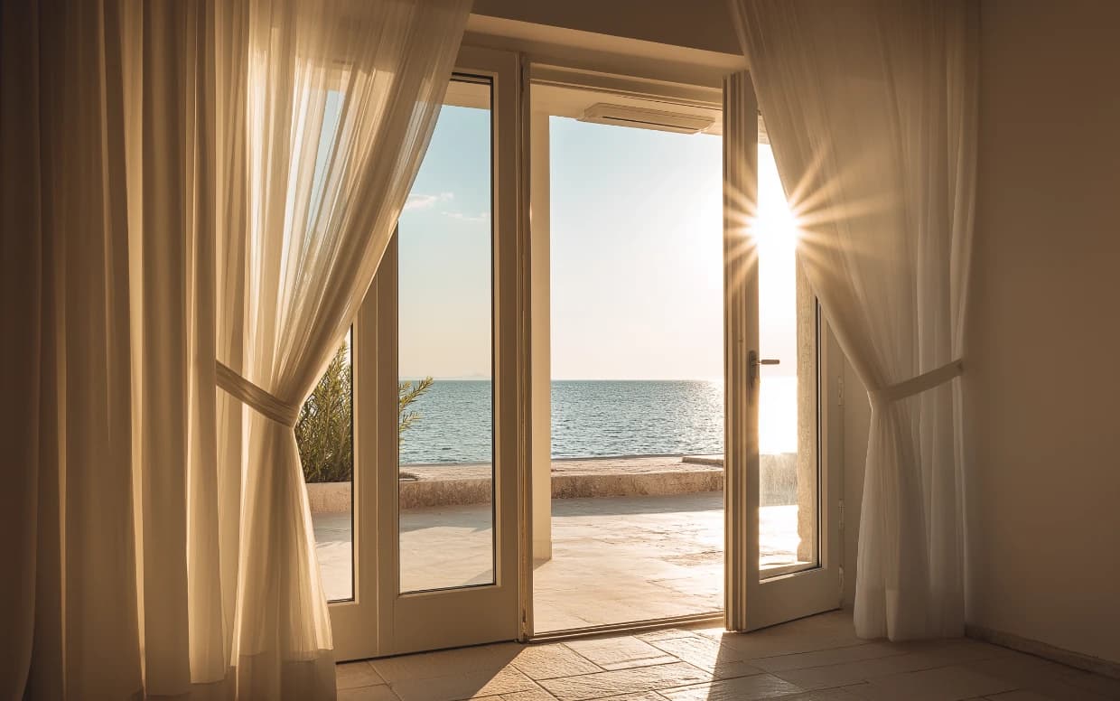 Sea view through curtains